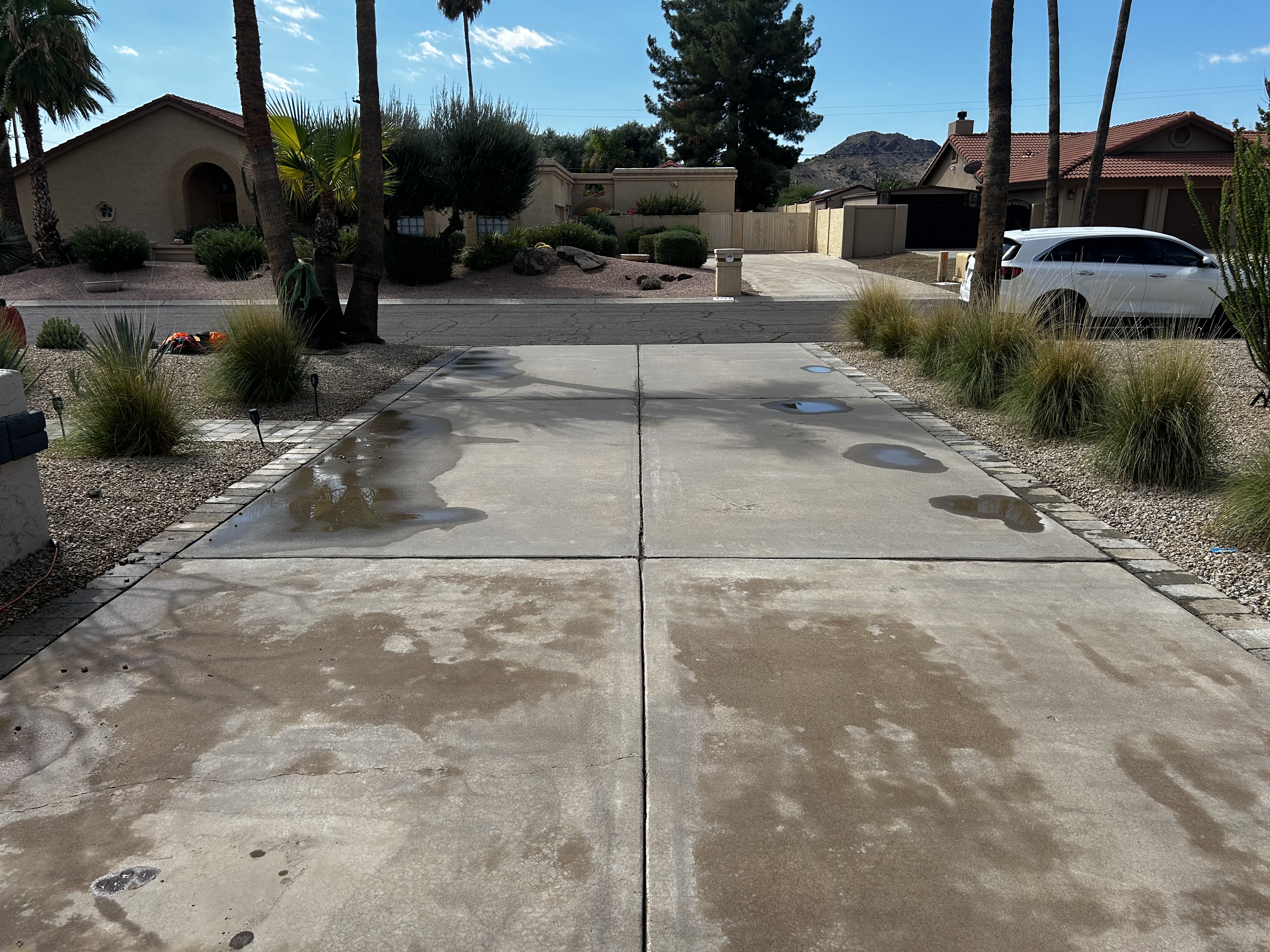 Clean driveway after pressure washing